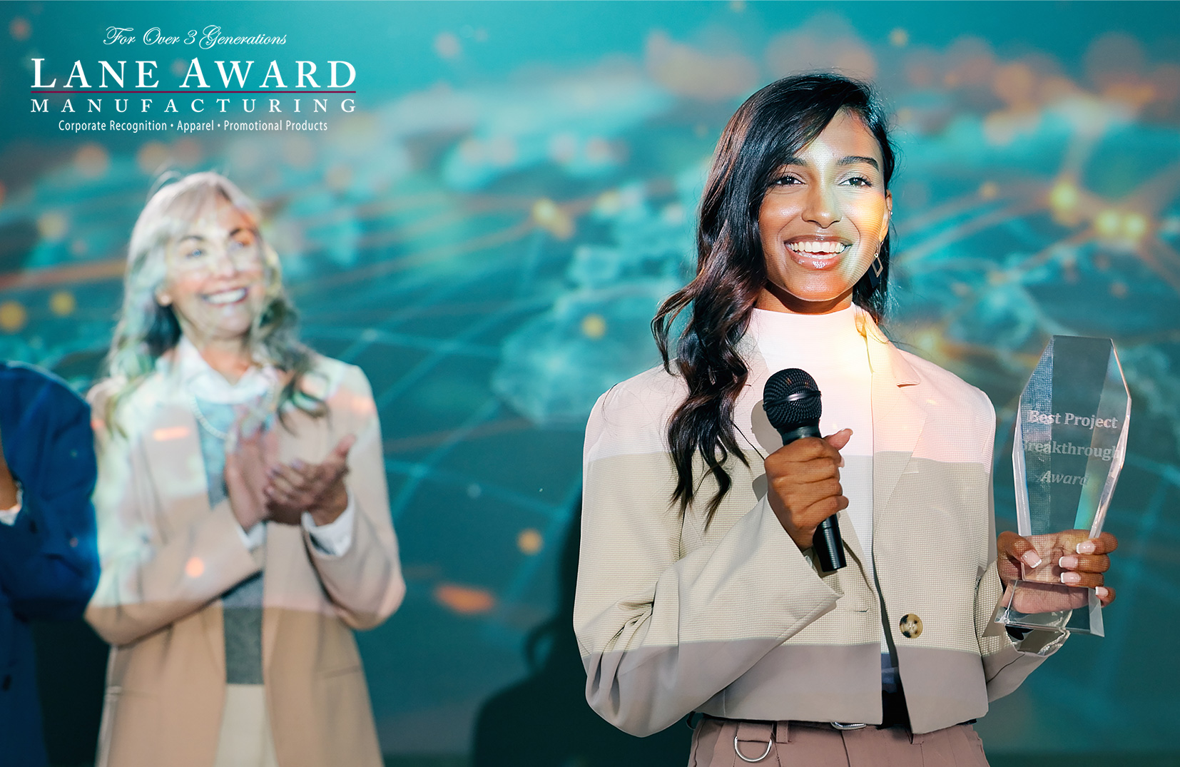 How Recognition Empowers Your Organization - Young Woman Winning An Award
